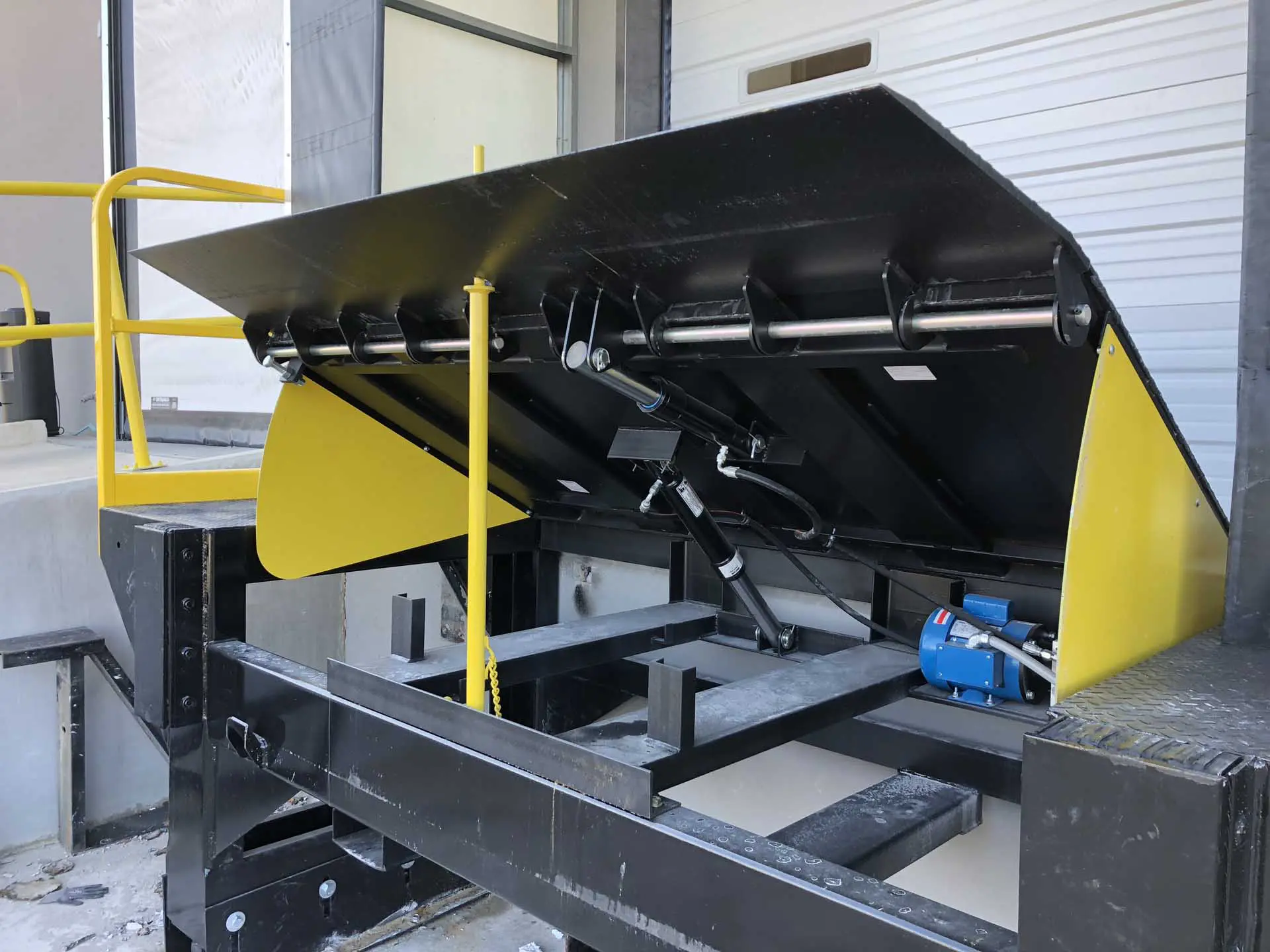 Dockzilla Hydraulic Dock Leveler Dock House with hydraulic dock leveler open