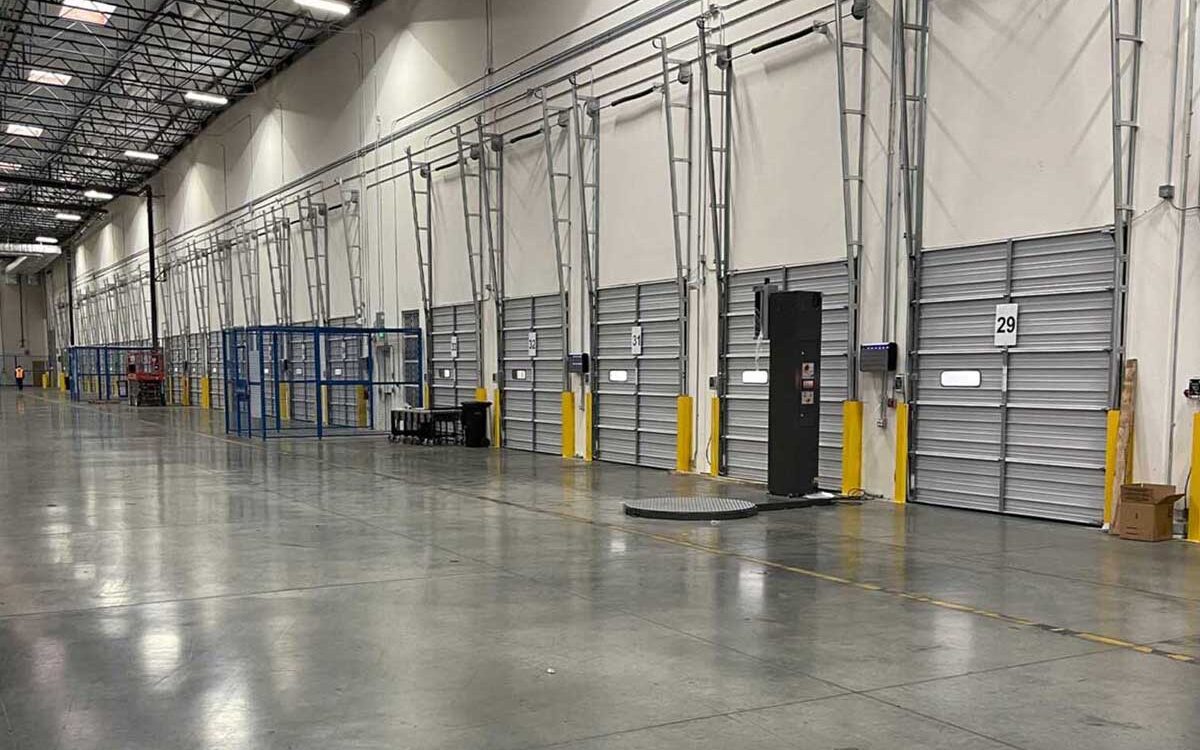 warehouse saves space with dock house dock leveler